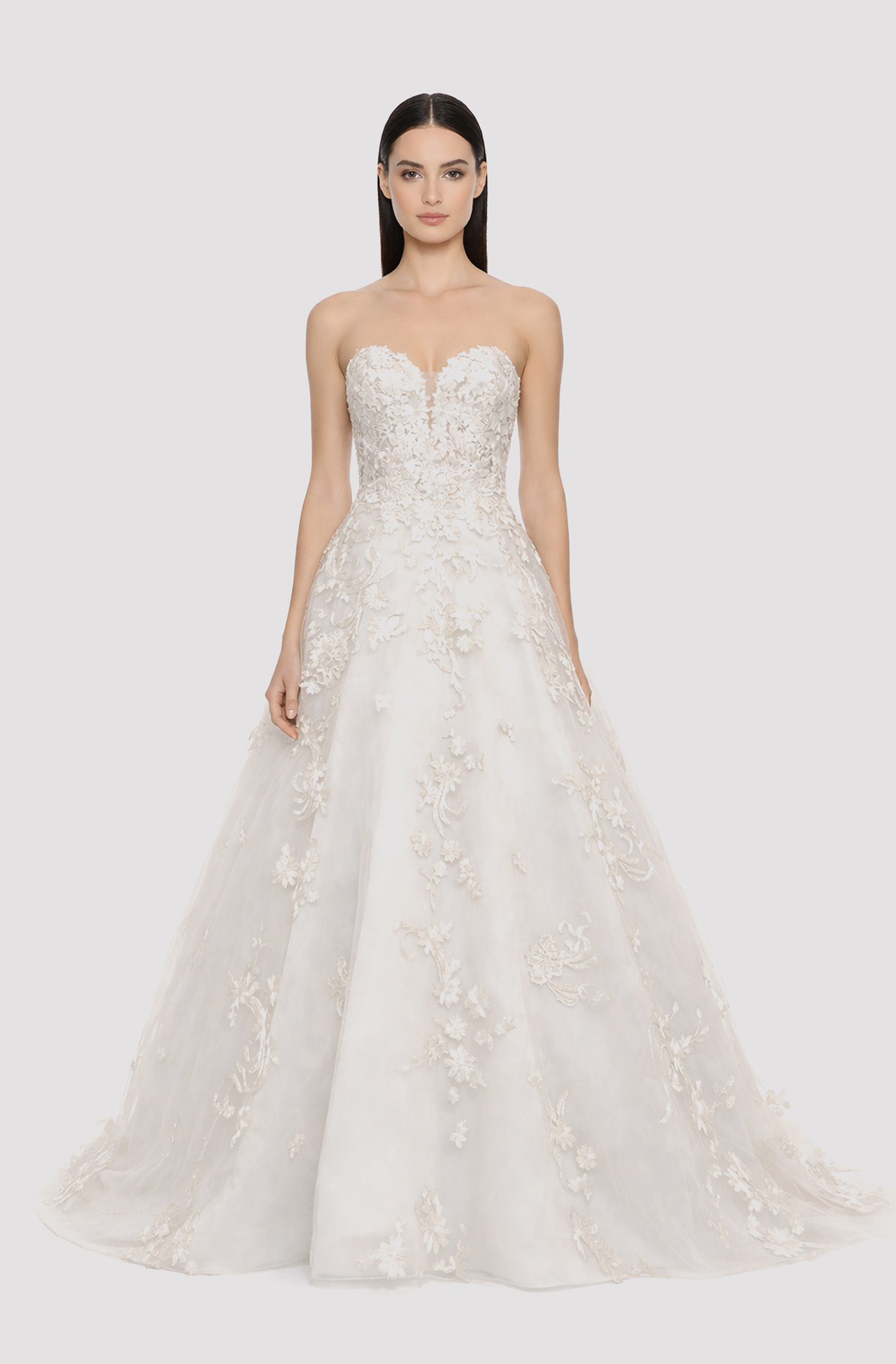 Front view of a woman in an Off-white tulle sweetheart neckline ball gown with cascading lace applique 15, image 1