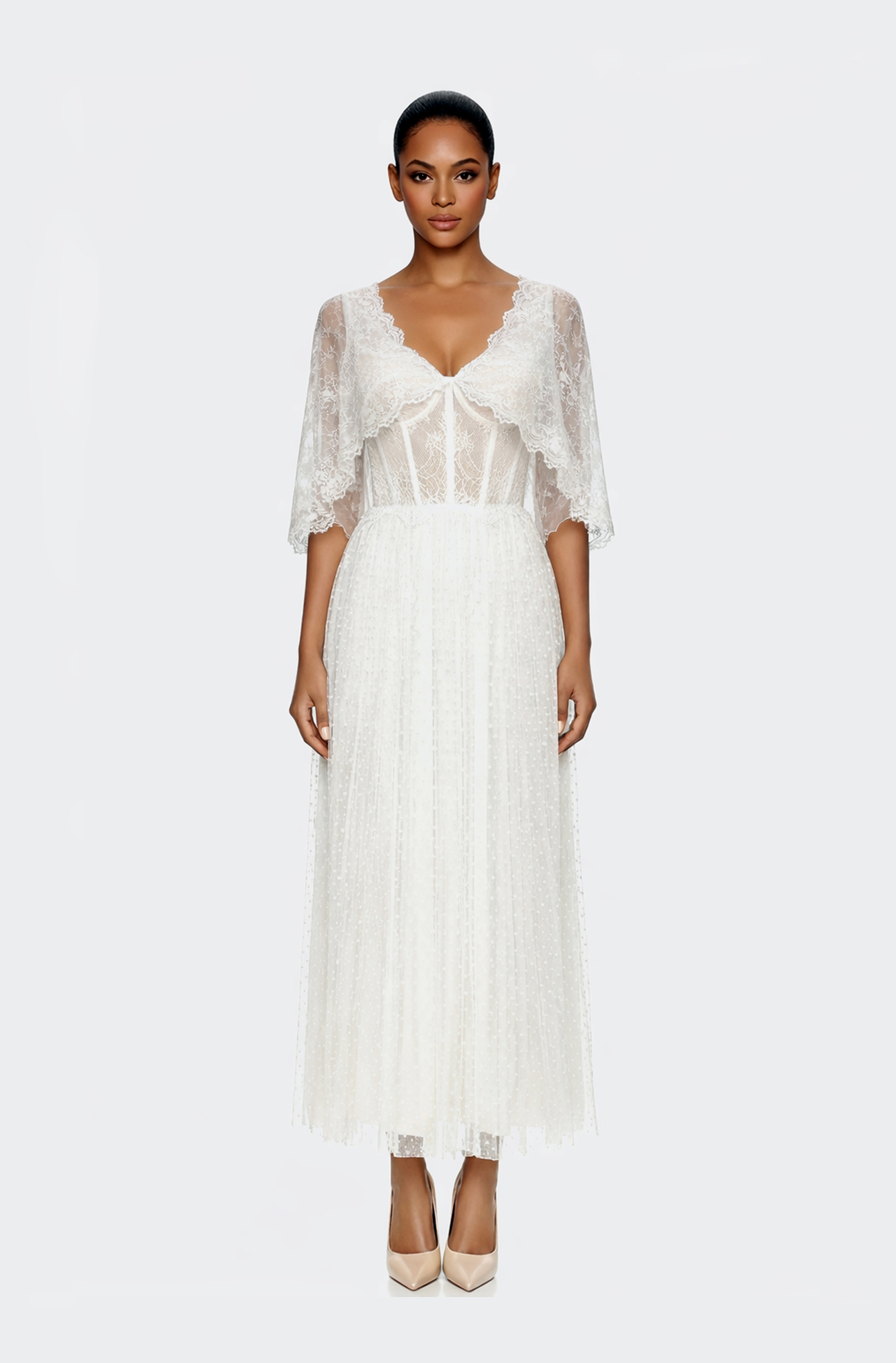 Front view of a woman in an Off-white midi dress with corseted French lace top and dotted Swiss organza electric-pleated skirt with capelet 40, image 1