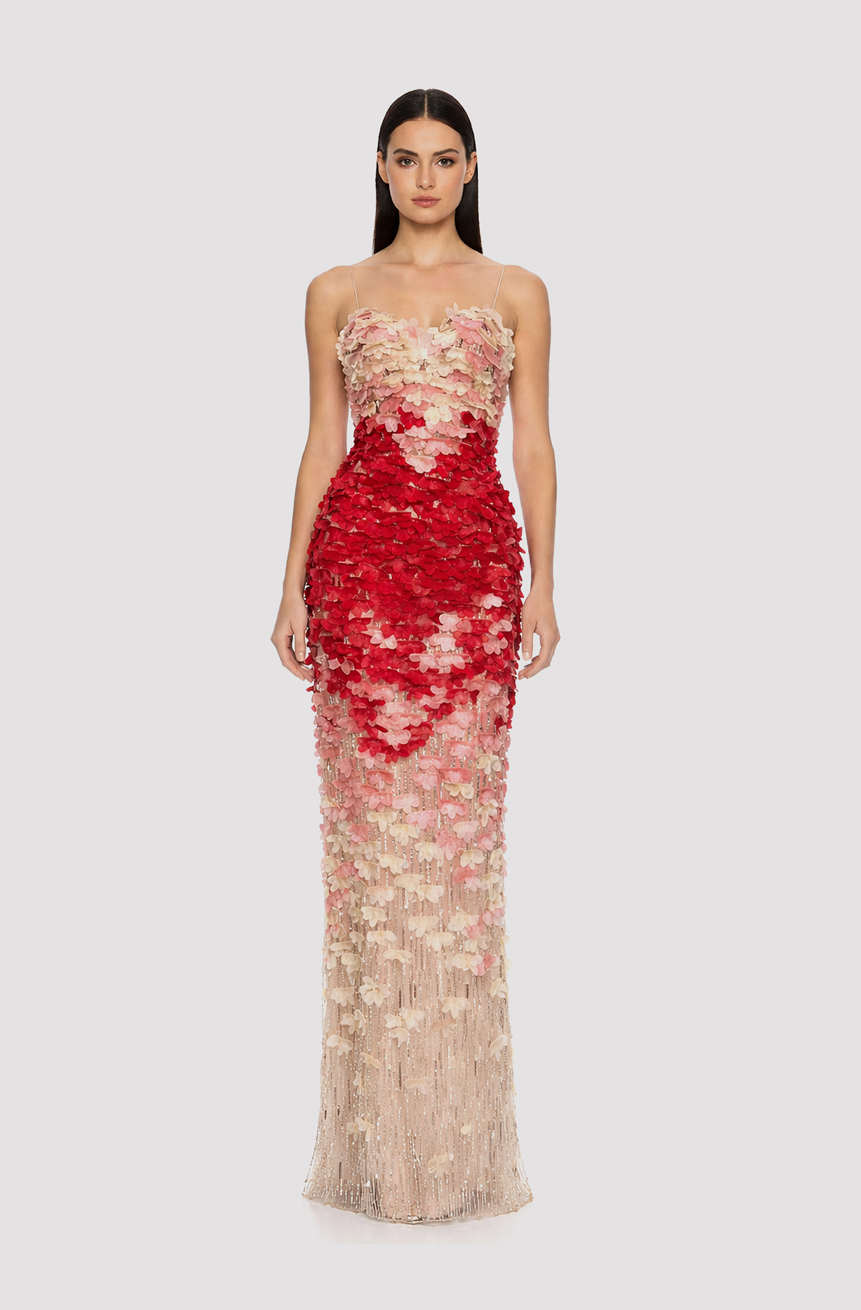 Front view of a woman in a Beaded champagne column gown with ivory, pink, and red 3D flowers 16, image 1