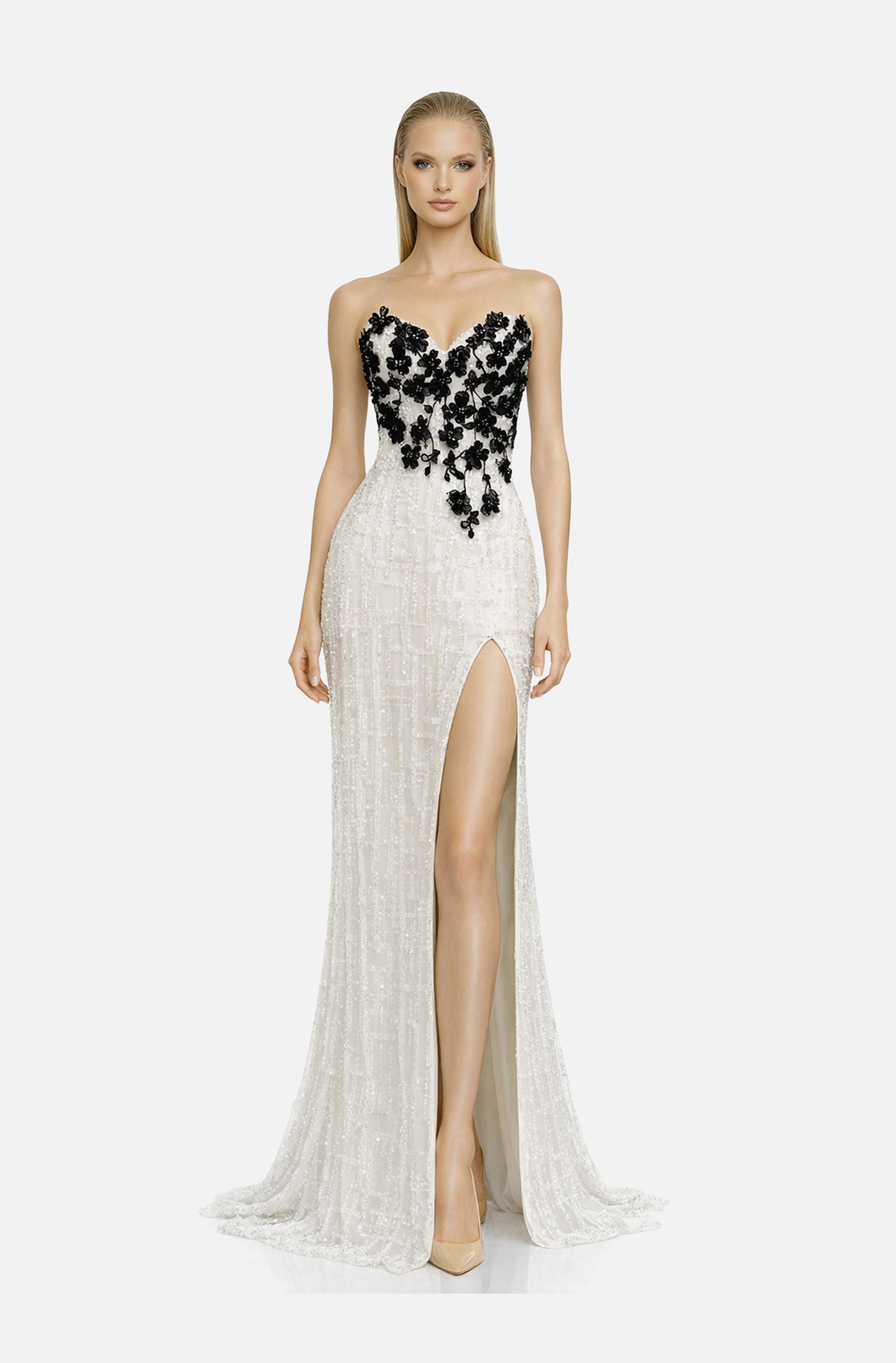 Front view of a woman in a White fully beaded column gown with sweetheart neckline embellished with black beaded floral appliqué and featuring high side slit 45, image 1