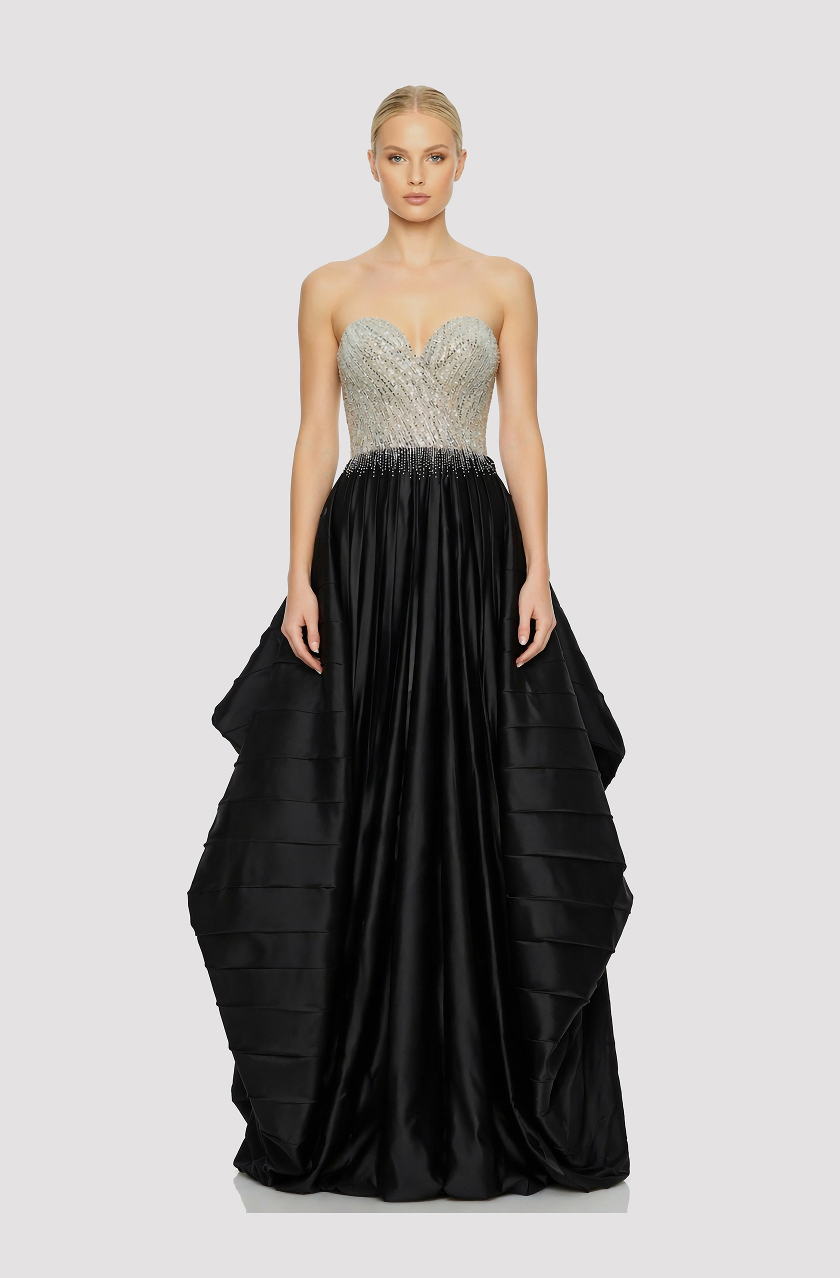 Front view of a woman in a Silver hand-beaded corset with black electric-pleated draped skirt 47, image 1