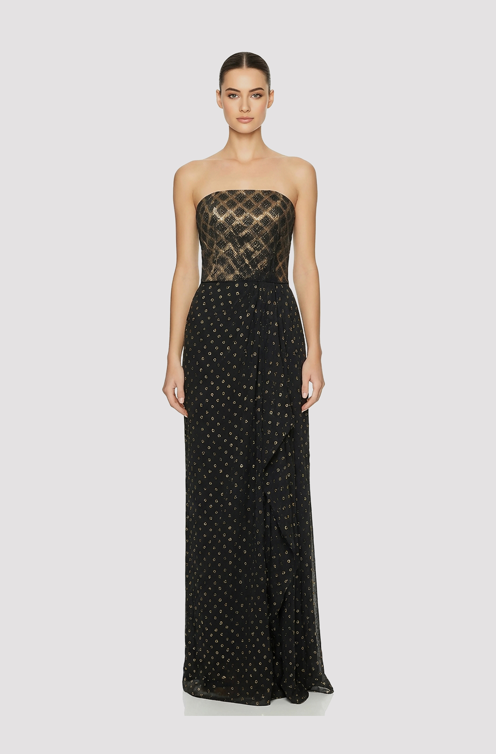 Front view of a woman in a Black and metallic gold gown with brocade tube top and hand-draped gold polka dot chiffon skirt 59, image 1